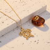 Collier tortue dorée - pierre travertin + verre ambré