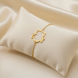 Bracelet chat doré - coussin ivoire 45°