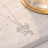 Collier tortue argent - macro travertin