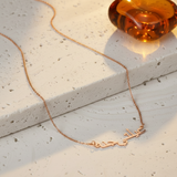 Collier prénom arabe rose doré - pierre travertin + verre ambré