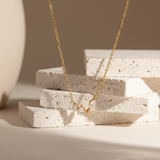 Collier 3 zircons - blocs travertin empiélés