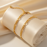 Bracelets Figaro or et argent - coussin ivoire 45°