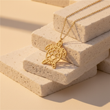 Collier tortue dorée - blocs travertin empiélés